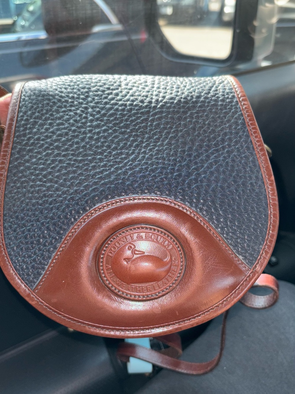 Dooney & Bourke Blue Pebbled Leather with Brown Leather Logo Patch Crossbody